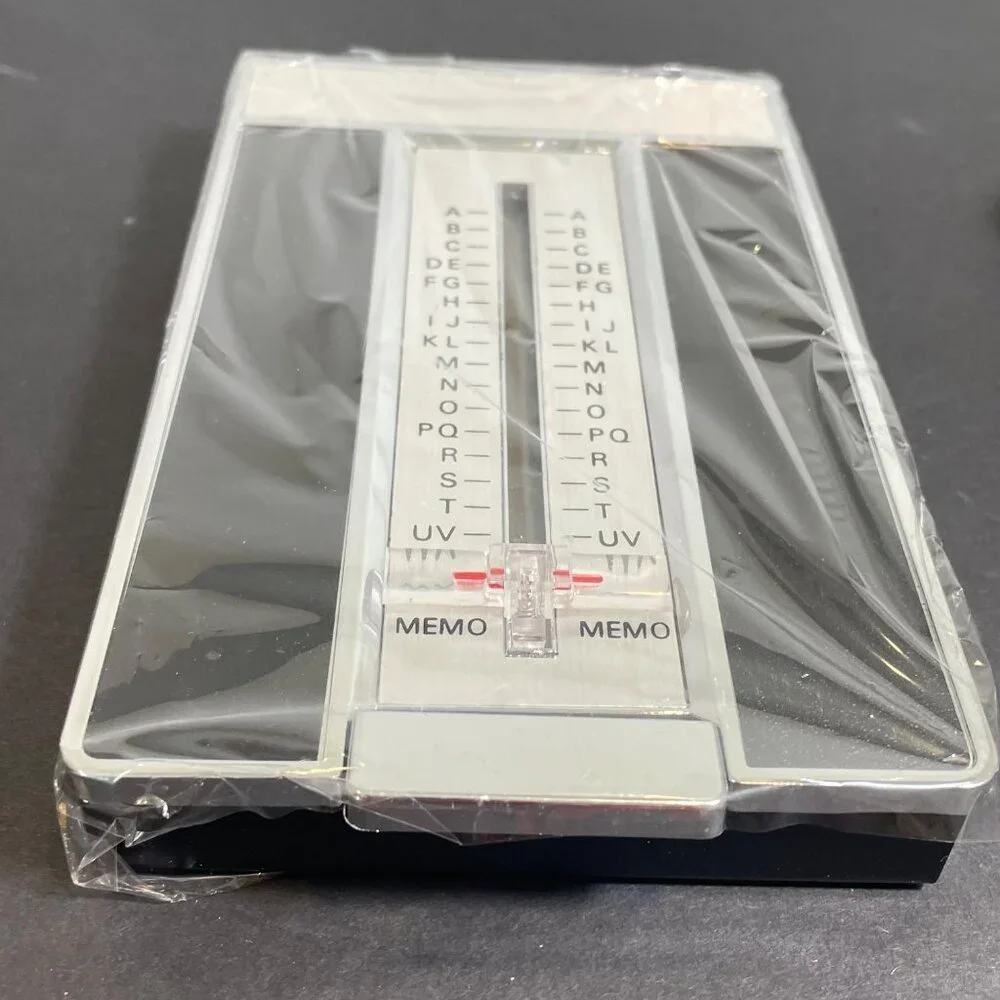 Vintage Telephone List Finder With Chrome Trimmed Design & Woodgrain Look